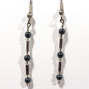 EARRINGS - Beaded Black and Silver-tone pierced earrings.